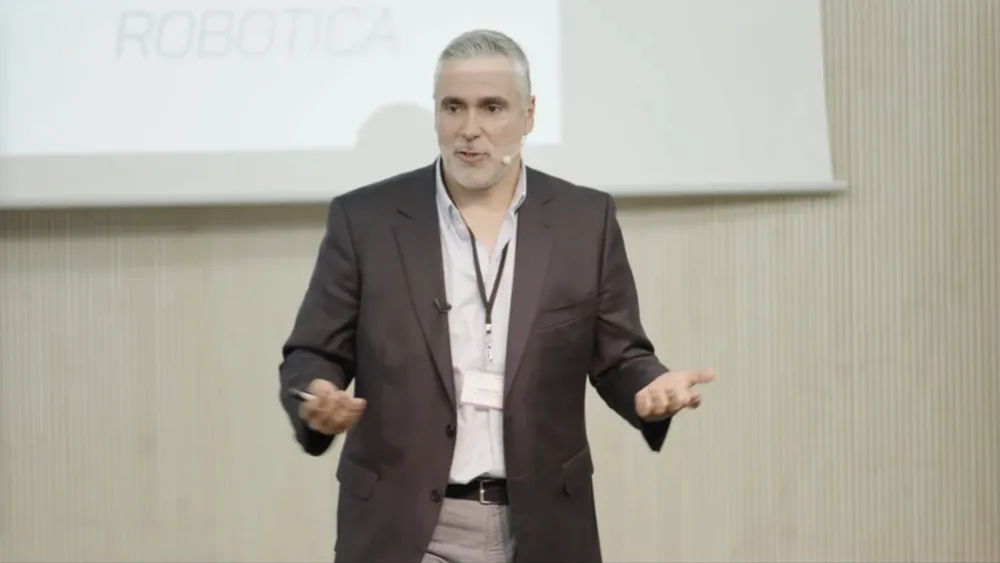 Sebastián J. Brau delivering a talk on industrial AI and the energy crisis, 2023